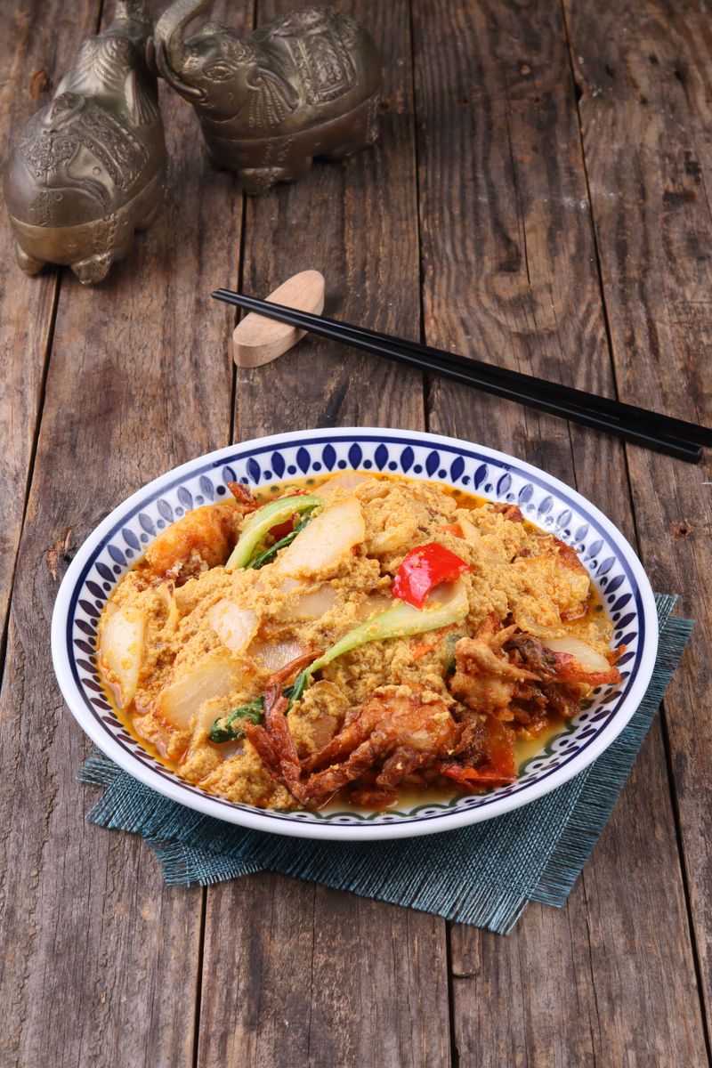 Crab curry served in a traditional setting
